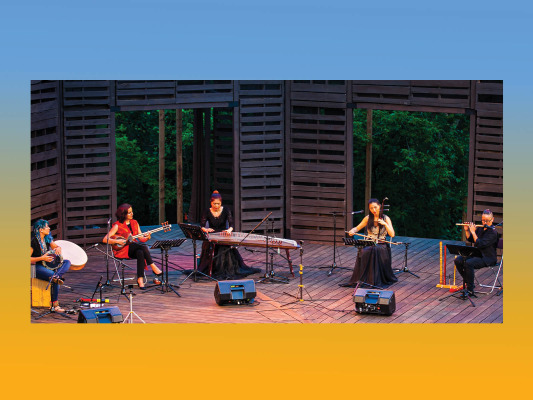 five performances on stage playing instruments