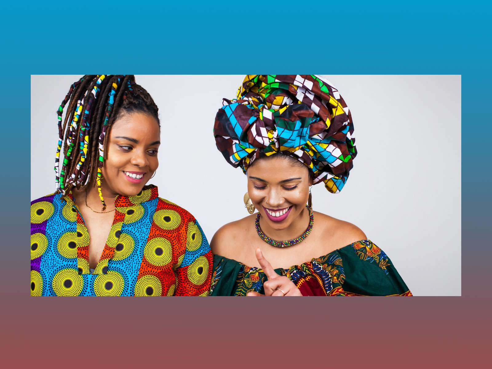 two african women in colourful clothes