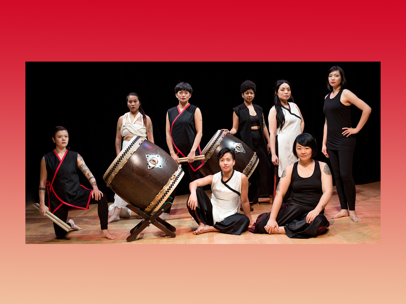eight asian women with taiko drums