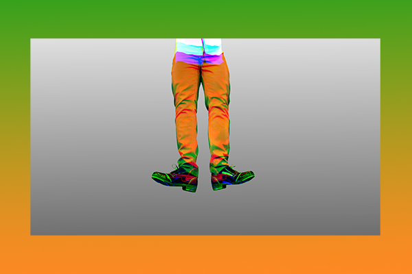 A pair of disembodied legs wearing colourful tap shoes.